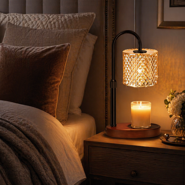 Crystal candle warmer lamp on bedroom nightstand beside bed — soft bedside ambience