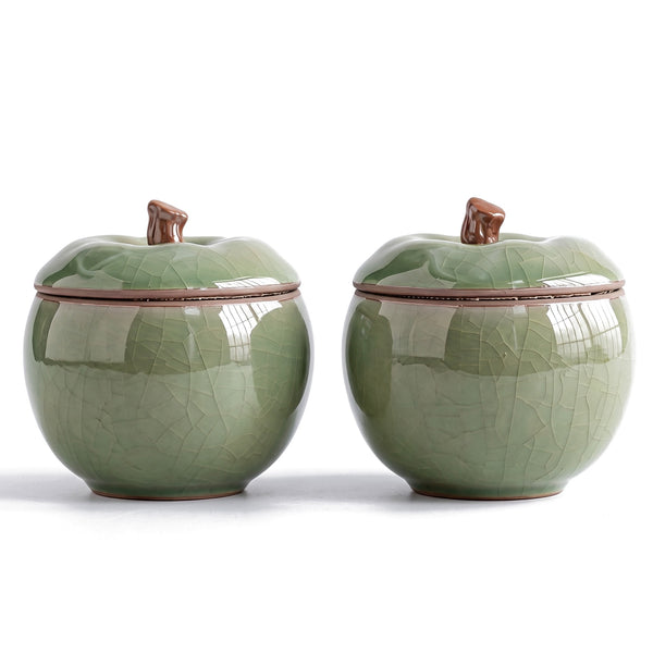 Trinket jar set of 2 — light green ceramic apple jars with stem-knob lids on white