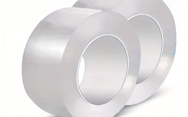 Two clear rolls of caulk tape on a white background