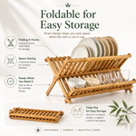 Bamboo dish rack loaded with plates, bowls, and cups