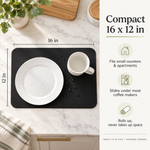 Dish drying mat size 16 x 12 inches with a dinner plate and mug for scale