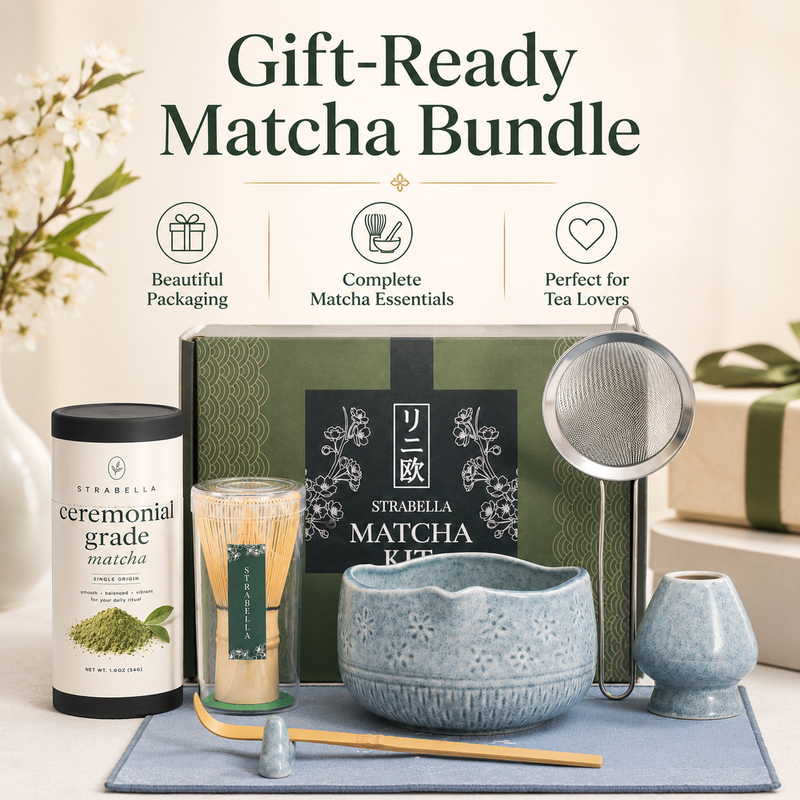 Blue ceramic chawan with stainless sifter, bamboo whisk, and ceremonial matcha for daily ritual