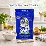 Fine ground celtic sea salt texture close-up — unrefined gray crystals