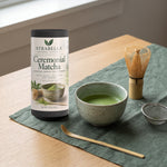 Asanagi ceremonial matcha whisked in a bowl with bamboo whisk and scoop