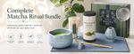 Complete matcha ritual bundle with blue ceramic bowl, bamboo whisk set, and ceremonial grade matcha powder