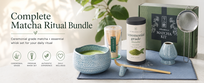 Complete matcha ritual bundle with blue ceramic bowl, bamboo whisk set, and ceremonial grade matcha powder