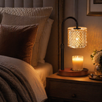 Crystal candle warmer lamp on bedroom nightstand beside bed — soft bedside ambience