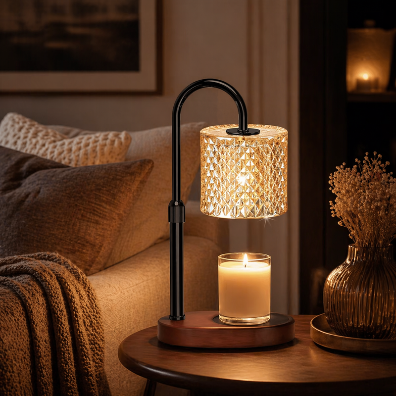 Crystal candle warmer lamp on living room side table with throw blanket and dried flowers