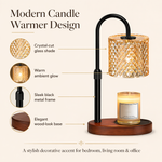 Modern candle warmer design — crystal-cut glass shade, warm glow, sleek black frame, wood base