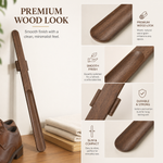 In-use entryway shot — long handle shoehorn at the door, no bending