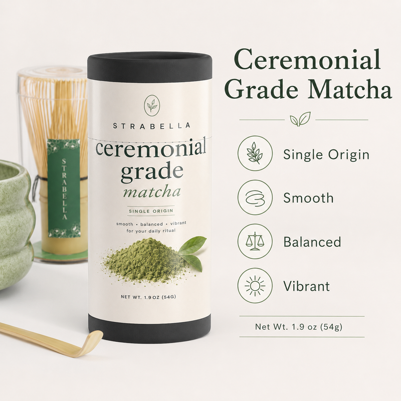 Bamboo matcha whisk and chashaku scoop beside Strabella ceremonial matcha tin and green bowl