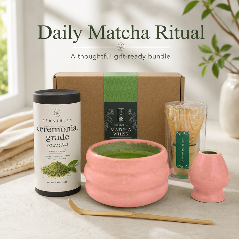 Pink ceramic matcha bowl and whisk holder styled for a gift-ready daily matcha ritual