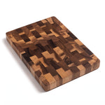 End grain cutting board — solid wood checkerboard board on a white background