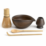 Gilt matcha ceremony set 5 pieces — ceramic bowl, bamboo whisk, holder, scoop and spoon on white background
