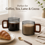 Strabella smoke-gray glass mugs holding coffee and latte — for coffee, tea, latte and cocoa