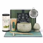 Green matcha gift bundle — sage-green ceramic chawan, bamboo whisk, holder, scoop, sifter, ceremonial grade matcha tin and gift box on white
