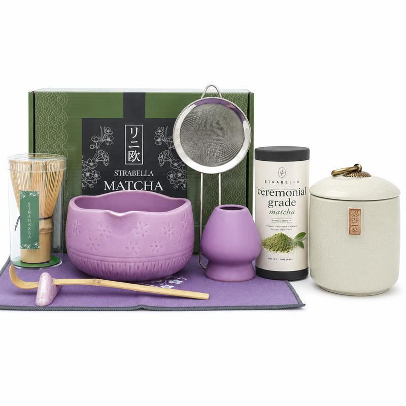 Matcha Queen ritual bundle in Purple — ceramic bowl, bamboo whisk, scoop, whisk holder, stainless sifter, ceremonial matcha, ceramic canister and mat in a gift box