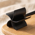 Meat chopper close-up — the pinwheel head with wide beveled blades