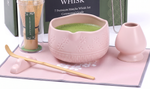 Pink matcha set arranged on the sakura tea mat